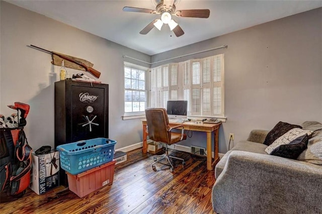 office space featuring dark hardwood / wood-style floors and ceiling fan