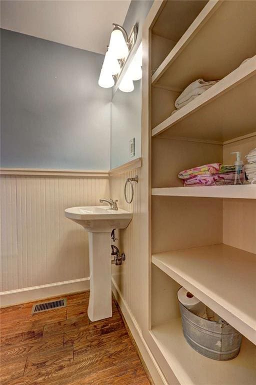 bathroom featuring hardwood / wood-style flooring