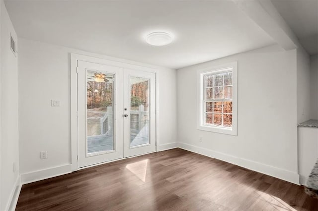 doorway featuring dark wood-type flooring and french doors