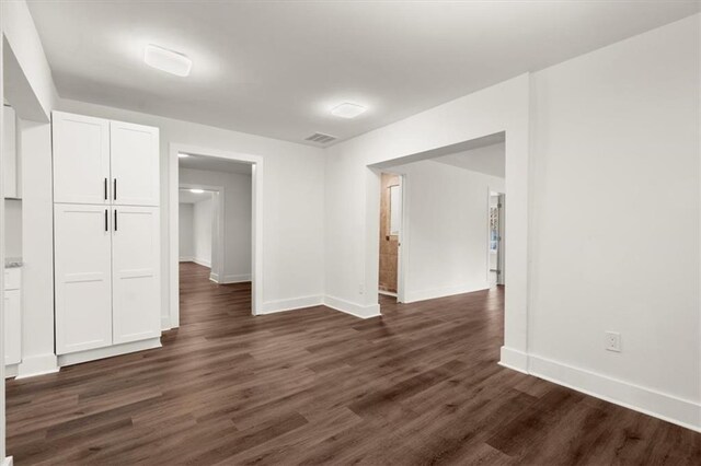 interior space with dark wood-type flooring