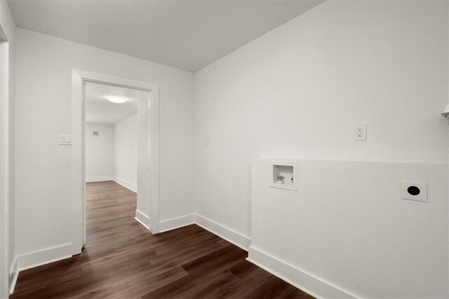 clothes washing area featuring electric dryer hookup, dark hardwood / wood-style flooring, and hookup for a washing machine