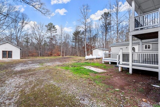 view of yard featuring a deck