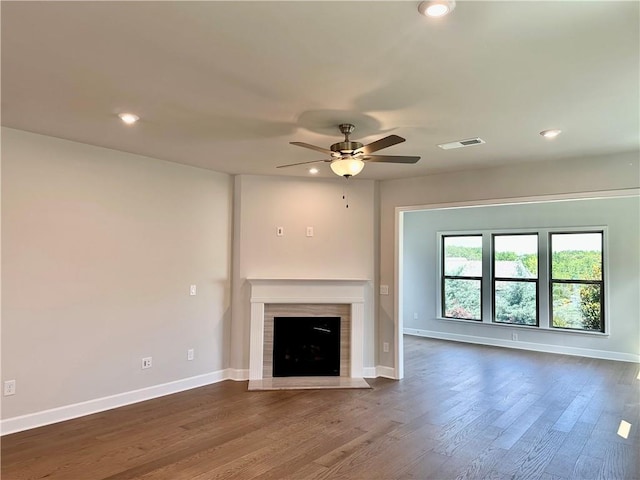 2808 Turnwater St, Hoschton, GA 30548 - unfurnished living room featuring a ceiling fan, recessed lighting, dark wood finished floors, and a fireplace with flush hearth