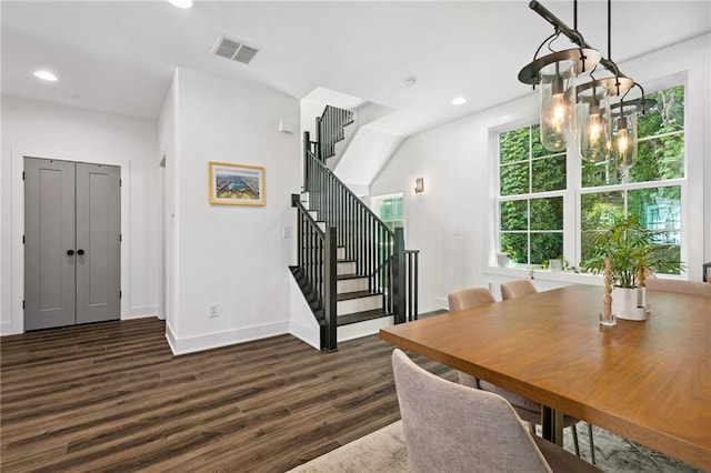 24 Becker Pl NW, Atlanta, GA 30307 - dining area featuring a chandelier, dark wood-style floors, baseboards, stairs, and recessed lighting