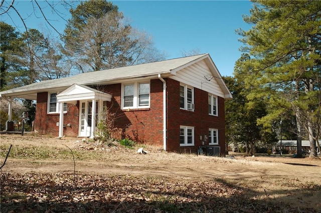 split foyer home with brick siding