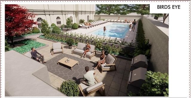 view of pool featuring a patio