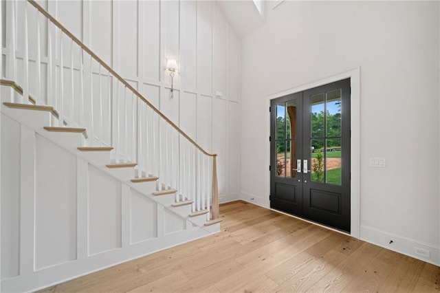 615 Claxton Ln, Milton, GA 30004 - foyer featuring baseboards, wood finished floors, french doors, and stairway