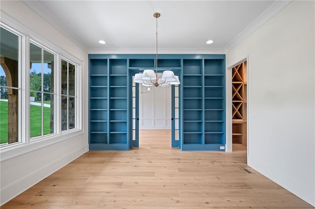 615 Claxton Ln, Milton, GA 30004 - unfurnished dining area featuring ornamental molding, a chandelier, healthy amount of natural light, wood finished floors, and recessed lighting