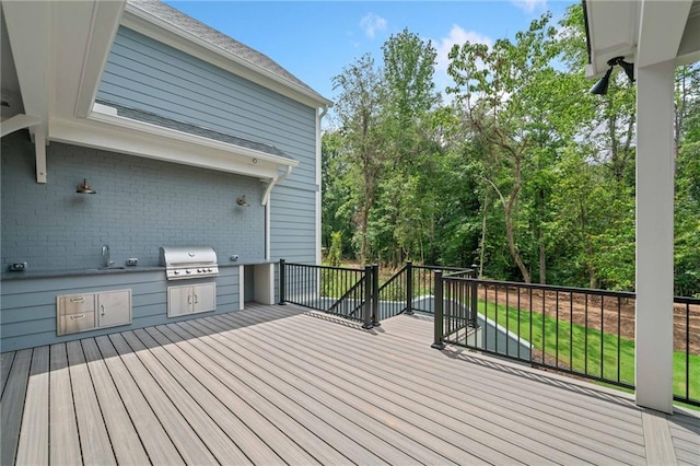 615 Claxton Ln, Milton, GA 30004 - wooden deck with grilling area and a sink