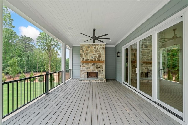 615 Claxton Ln, Milton, GA 30004 - deck with an outdoor stone fireplace, ceiling fan, and a yard