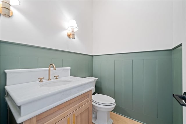 615 Claxton Ln, Milton, GA 30004 - bathroom with toilet, wainscoting, and vanity