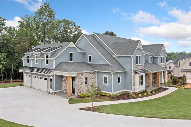 615 Claxton Ln, Milton, GA 30004 - view of front of property with a front lawn, driveway, stone siding, an attached garage, and a shingled roof
