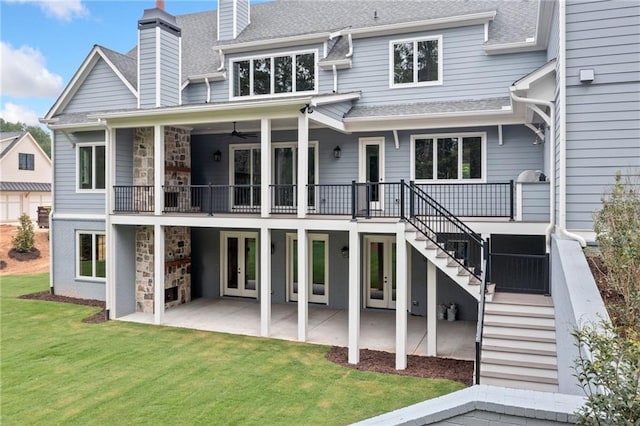 615 Claxton Ln, Milton, GA 30004 - back of property with french doors, stairs, a lawn, a patio, and a chimney