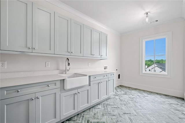 615 Claxton Ln, Milton, GA 30004 - washroom with electric dryer hookup, cabinet space, baseboards, and ornamental molding