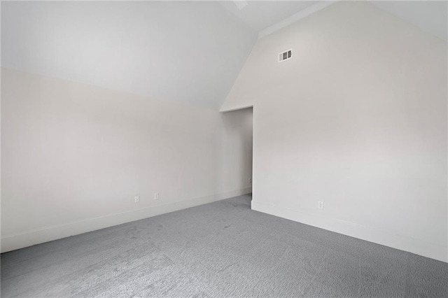 615 Claxton Ln, Milton, GA 30004 - carpeted empty room featuring vaulted ceiling and baseboards