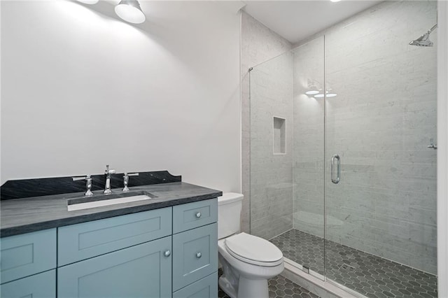 615 Claxton Ln, Milton, GA 30004 - bathroom featuring toilet, a stall shower, and vanity