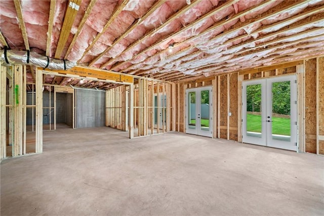 615 Claxton Ln, Milton, GA 30004 - miscellaneous room with french doors and concrete floors