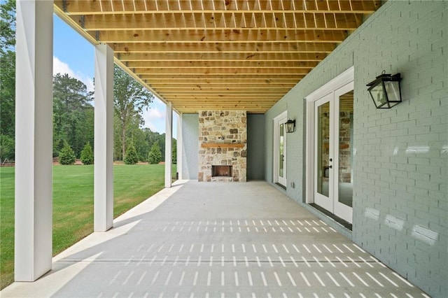 615 Claxton Ln, Milton, GA 30004 - view of patio featuring french doors and an outdoor stone fireplace