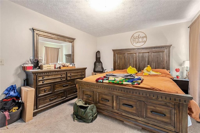 carpeted bedroom with a textured ceiling