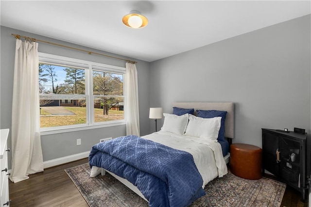 1055 Delmont Ter, Roswell, GA 30075 - bedroom with wood finished floors and baseboards