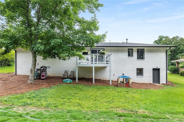 1055 Delmont Ter, Roswell, GA 30075 - rear view of house with a lawn, a wooden deck, brick siding, and central AC
