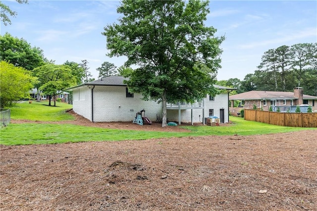 1055 Delmont Ter, Roswell, GA 30075 - rear view of property featuring brick siding