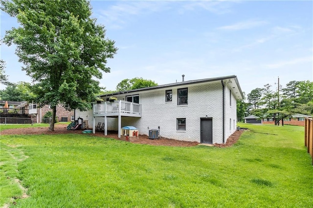 1055 Delmont Ter, Roswell, GA 30075 - back of property with cooling unit, brick siding, and a wooden deck