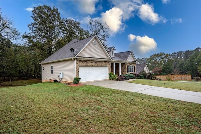 view of front property featuring a garage and a front yard