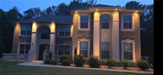 2709 Ratby Ln NE, Conyers, GA 30013 - view of front of house featuring brick siding and a front lawn