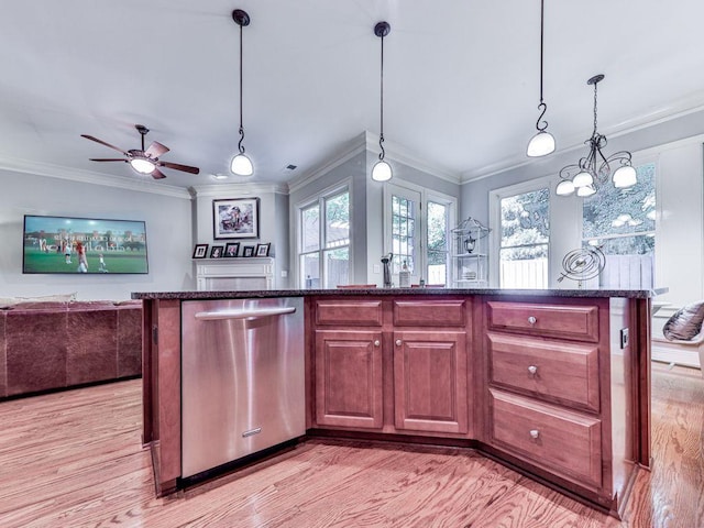 kitchen featuring stainless steel dishwasher, light wood-style flooring, ornamental molding, open floor plan, and dark stone counters