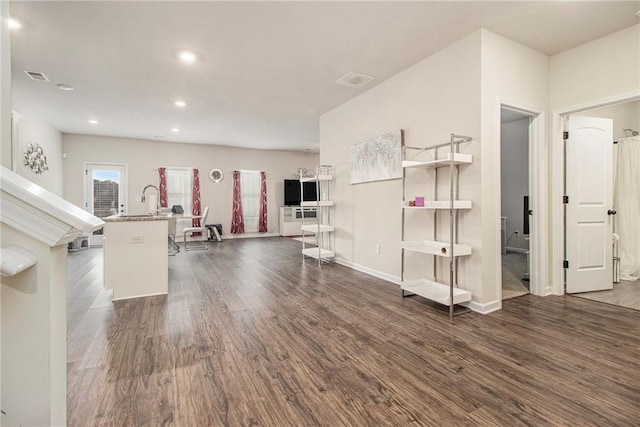 interior space with dark hardwood / wood-style flooring