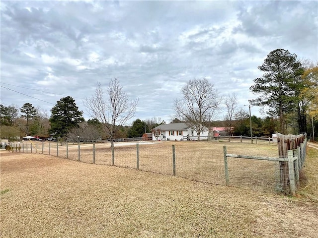 view of yard with a rural view