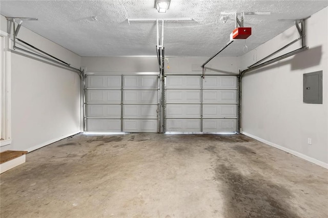 garage featuring electric panel and a garage door opener