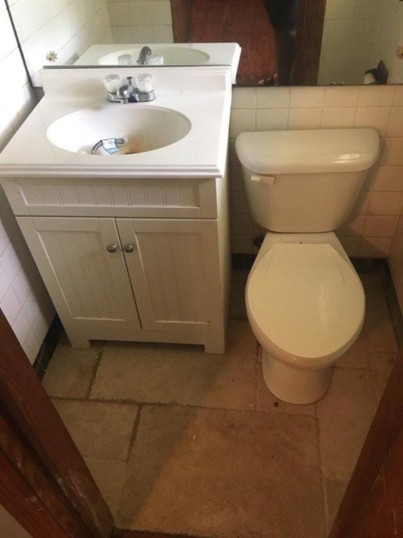1410 Willis Mill Rd SW, Atlanta, GA 30311 - half bath featuring vanity and tile walls