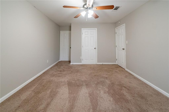 unfurnished bedroom with carpet and ceiling fan