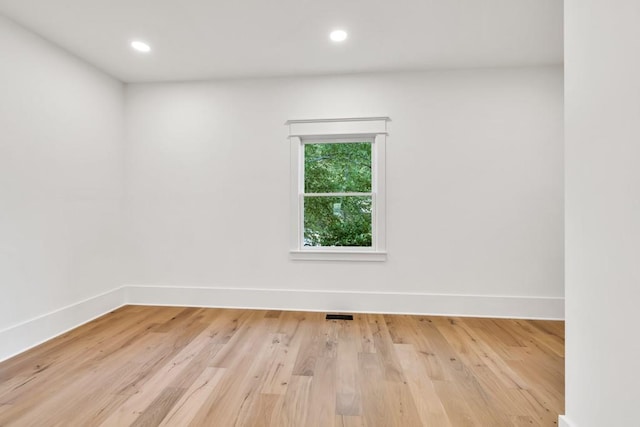 2335 Flat Stone Dr, Cumming, GA 30041 - empty room featuring light wood-style flooring, baseboards, visible vents, and recessed lighting