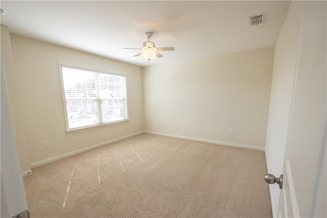 2034 W Hampton Dr, Canton, GA 30115 - empty room featuring visible vents, ceiling fan, light colored carpet, and baseboards