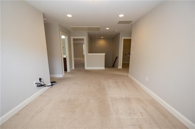 2034 W Hampton Dr, Canton, GA 30115 - unfurnished room with light carpet, attic access, visible vents, and recessed lighting