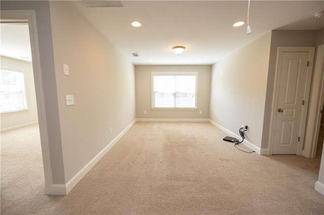 2034 W Hampton Dr, Canton, GA 30115 - empty room with baseboards, recessed lighting, and light carpet