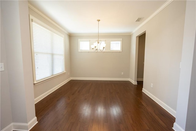2034 W Hampton Dr, Canton, GA 30115 - unfurnished dining area with dark wood-type flooring, crown molding, a notable chandelier, and baseboards