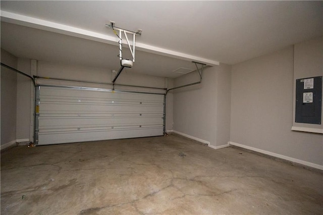 2034 W Hampton Dr, Canton, GA 30115 - garage featuring electric panel and baseboards