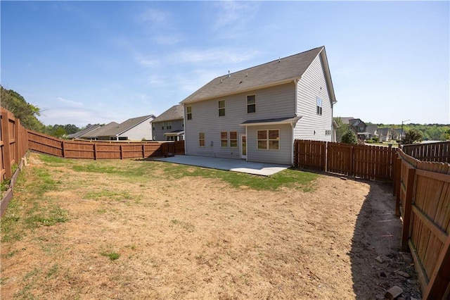 2034 W Hampton Dr, Canton, GA 30115 - rear view of house with a patio area, a fenced backyard, and a lawn