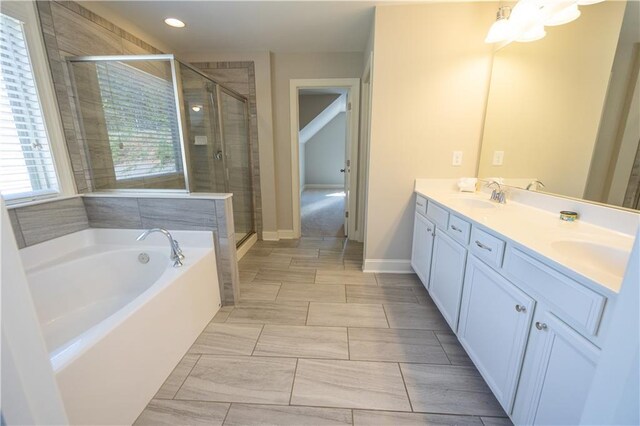 2034 W Hampton Dr, Canton, GA 30115 - bathroom with double vanity, a bath, a sink, and a stall shower