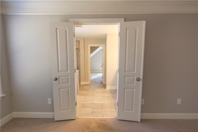 2034 W Hampton Dr, Canton, GA 30115 - spare room featuring baseboards, light colored carpet, and ornamental molding