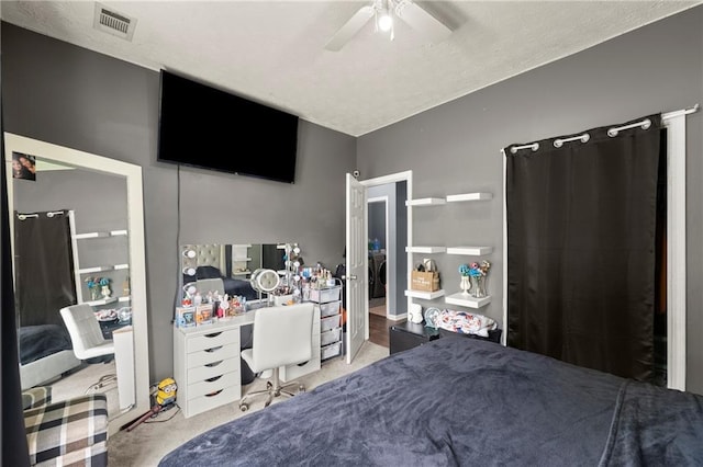 bedroom with light colored carpet, visible vents, and ceiling fan