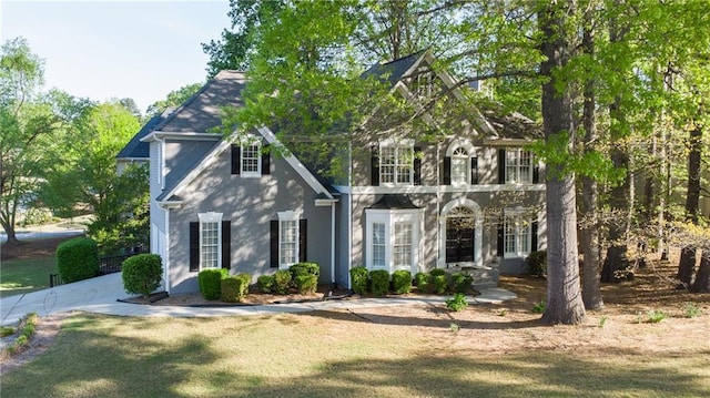 251 Waterford Cove Dr, Suwanee, GA 30024 - view of front of property with stucco siding and a front yard