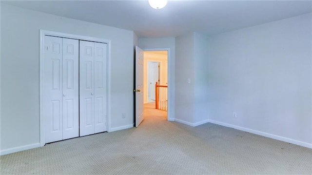 251 Waterford Cove Dr, Suwanee, GA 30024 - unfurnished bedroom with carpet, a closet, and baseboards