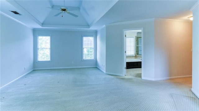 251 Waterford Cove Dr, Suwanee, GA 30024 - empty room featuring light colored carpet, healthy amount of natural light, ceiling fan, a tray ceiling, and crown molding