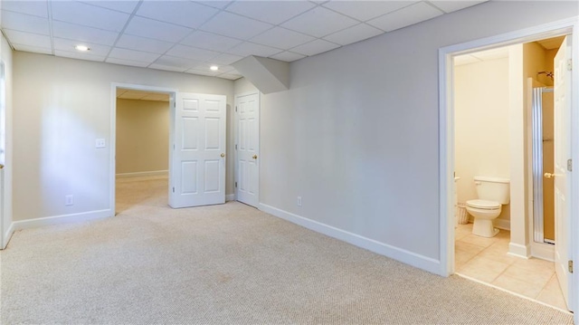 251 Waterford Cove Dr, Suwanee, GA 30024 - unfurnished bedroom with light carpet, baseboards, ensuite bath, a paneled ceiling, and recessed lighting