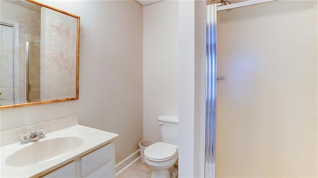 251 Waterford Cove Dr, Suwanee, GA 30024 - full bathroom with a shower stall, vanity, toilet, tile patterned floors, and baseboards